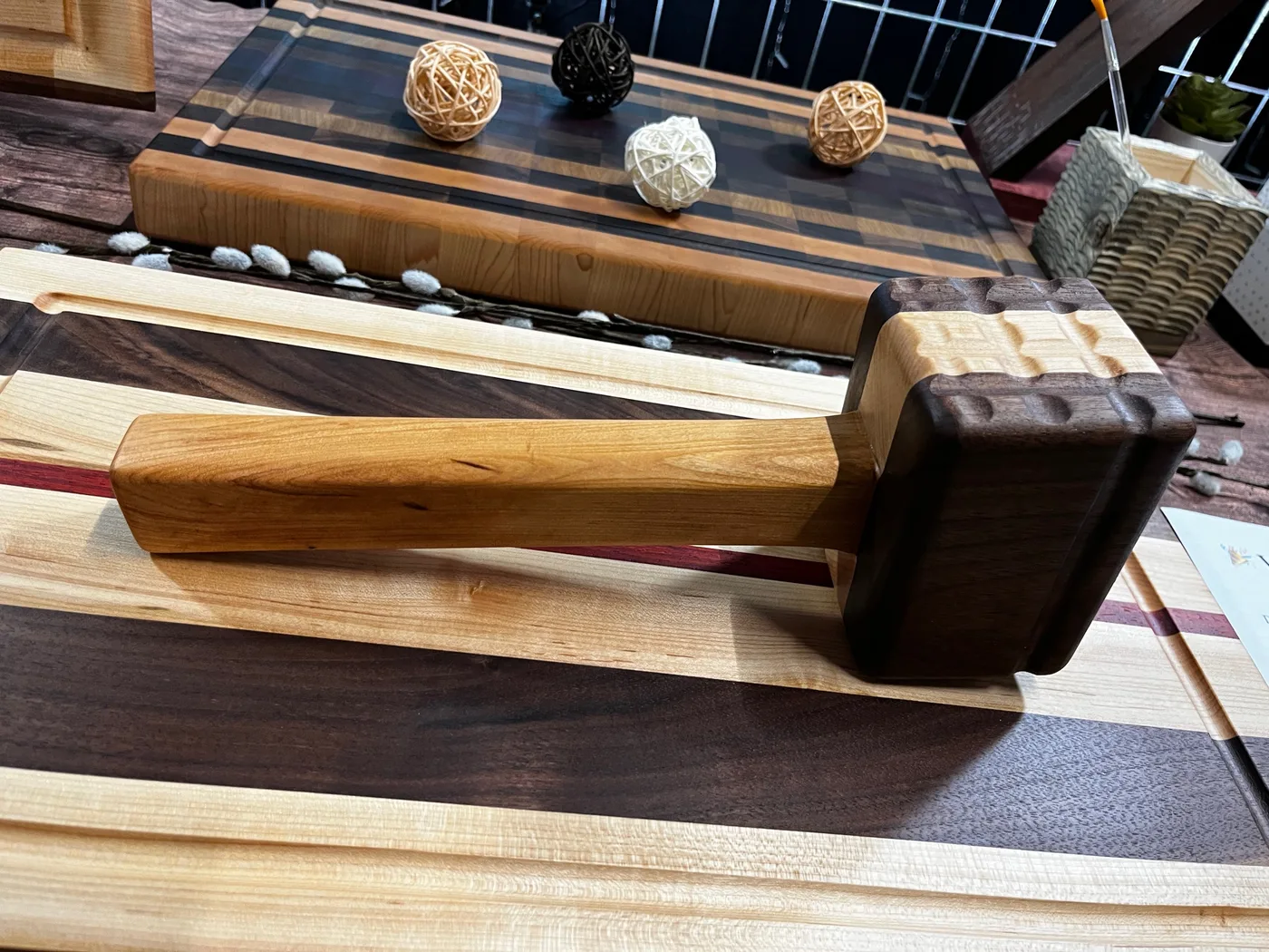 Small handmade wooden kitchen mallet with contrasting handle